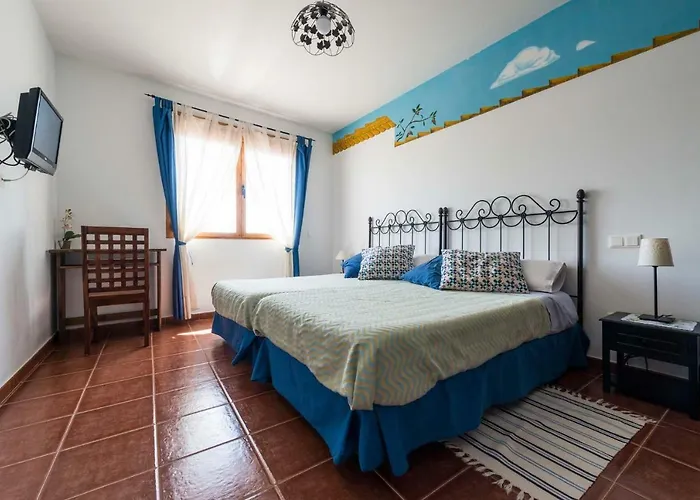 El Descanso De Lares 乡村民宿